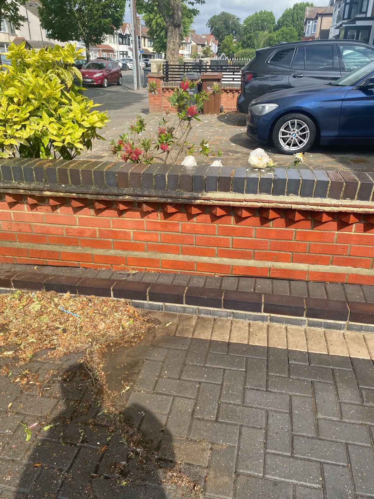 Brickwork and paving before jet wash cleaning