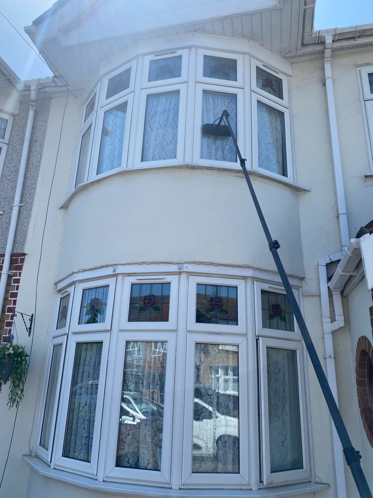 Crystal Bright window cleaning with a water-fed pole
